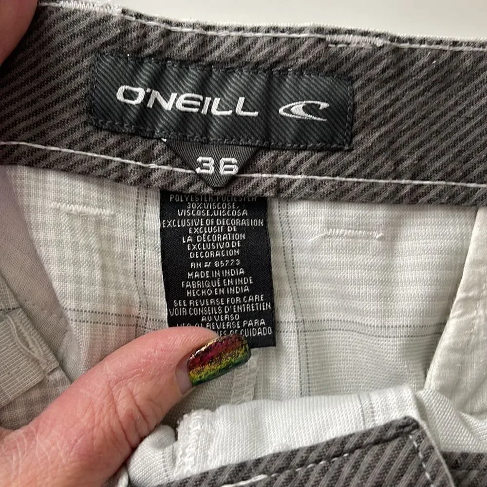 O’Neill golf shorts.  Size 36 waist.  Grey and white plaid.